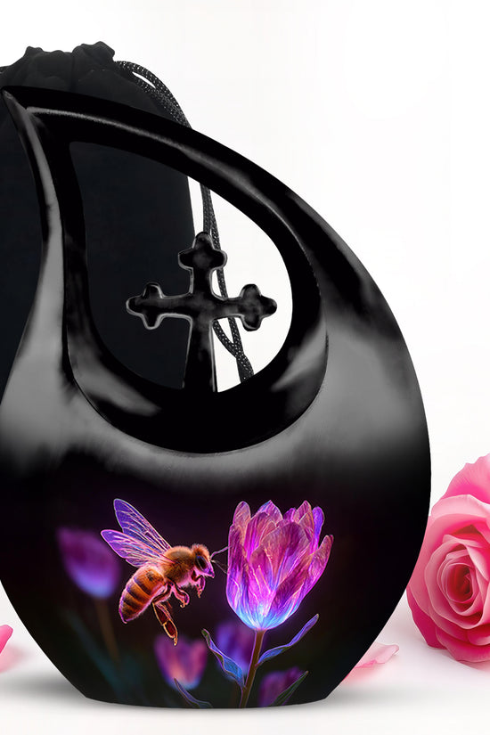 Deep Black Bee Cremation Urn top-down view of secure threaded lid - sacred cross merged with bee motif on metal - full-size 10 inch 200 cubic inch adult cremation urn