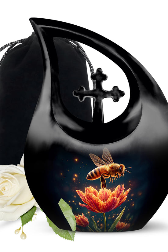 Glossy Black Bee Cremation Urn top-down view of secure threaded lid - sacred cross merged with bee motif on metal - full-size 10 inch 200 cubic inch adult cremation urn