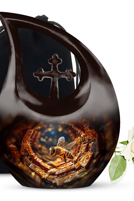 Deep Red Bee Cremation Urn top-down view of secure threaded lid - sacred cross merged with bee motif on metal - full-size 10 inch 200 cubic inch adult cremation urn
