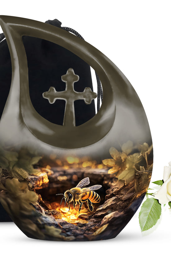 Champagne Gold Bee Cremation Urn top-down view of secure threaded lid - sacred cross merged with bee motif on metal - full-size 10 inch 200 cubic inch adult cremation urn
