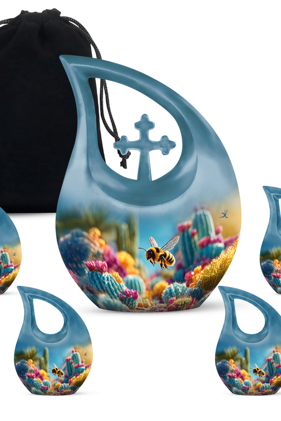 Pastel Blue Bee Cremation Urn urn with complimentary velvet bag - cross and bee combined in spiritual memorial design - memorial set with one large and four small urns