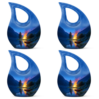 Navy Blue Campfire Cremation Urn lifestyle display on memorial shelf - sacred cross merged with campfire motif on metal - 10 inch aluminum urn for cremated remains