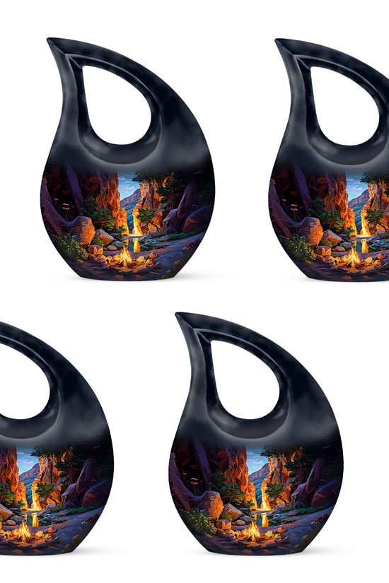 Misty Blue Campfire Cremation Urn lifestyle display on memorial shelf - sacred cross merged with campfire motif on metal - 10 inch aluminum urn for cremated remains