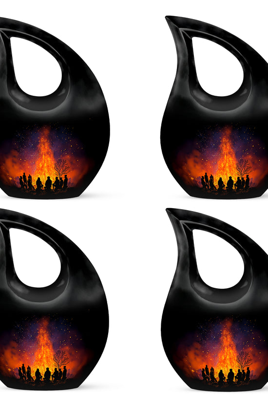 Midnight Black Campfire Cremation Urn lifestyle display on memorial shelf - faith-inspired cross-drop urn with campfire pattern - 10 inch aluminum urn for cremated remains