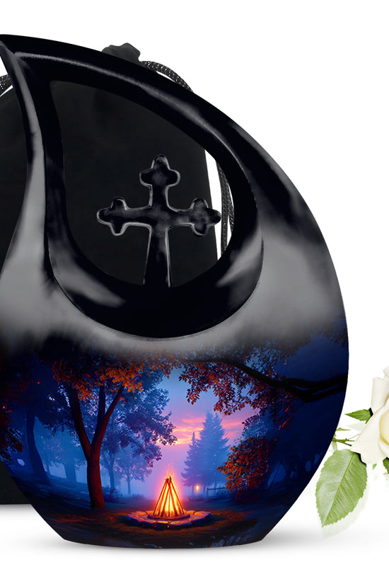 Glossy Black Campfire Cremation Urn top-down view of secure threaded lid - sacred cross merged with campfire motif on metal - full-size 10 inch 200 cubic inch adult cremation urn