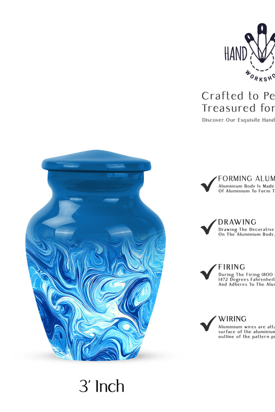 Dusty Blue Blue Cremation Urn close-up of engraving and surface detail - timeless blue motif etched into premium metal - mini keepsake memorial for portion of cremation ashes