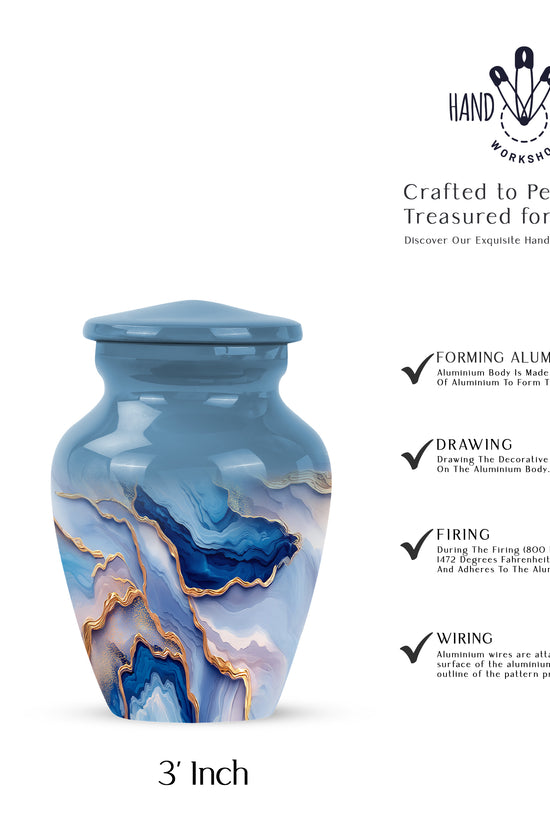 Indigo Blue Cremation Urn close-up of engraving and surface detail - classic sculpted blue pattern on smooth aluminum - mini keepsake memorial for portion of cremation ashes