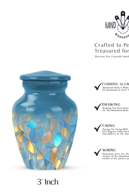 Sky Blue Blue Cremation Urn close-up of engraving and surface detail - classic sculpted blue pattern on smooth aluminum - mini keepsake memorial for portion of cremation ashes