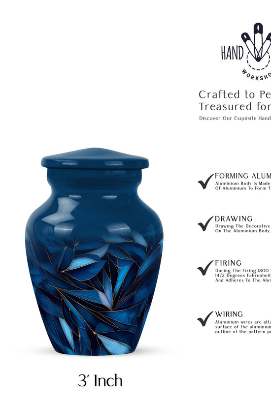 Indigo Blue Cremation Urn close-up of engraving and surface detail - classic sculpted blue pattern on smooth aluminum - mini keepsake memorial for portion of cremation ashes