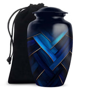 Celestial Blue Blue Cremation Urn angled view of lid and engraved motif - classic sculpted blue pattern on smooth aluminum - full-size 10 inch 200 cubic inch adult cremation urn