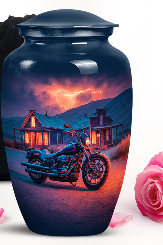 Serene Blue Bike Cremation Urn angled view of lid and engraved motif - traditional bike engraving with hand-polished finish - full-size 10 inch 200 cubic inch adult cremation urn