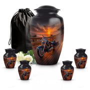 Deep Black Bike Cremation Urn top-down view of secure threaded lid - timeless bike motif etched into premium metal - memorial set with one large and four small urns