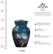 Cobalt Blue Bike Cremation Urn close-up of engraving and surface detail - traditional bike engraving with hand-polished finish - mini keepsake memorial for portion of cremation ashes