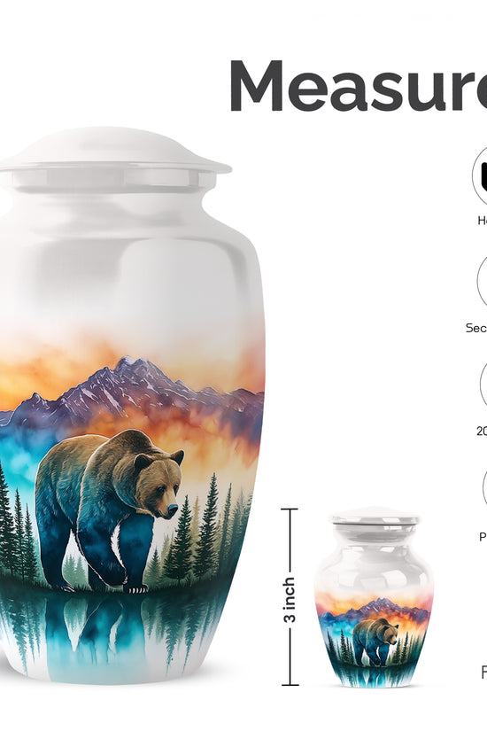 Gleaming Silver Bear Cremation Urn close-up of engraving and surface detail - classic sculpted bear pattern on smooth aluminum - mini keepsake memorial for portion of cremation ashes