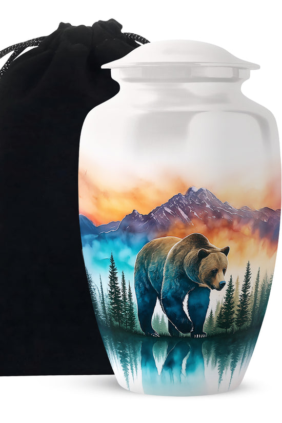 Platinum Silver Bear Cremation Urn angled view of lid and engraved motif - timeless bear motif etched into premium metal - full-size 10 inch 200 cubic inch adult cremation urn