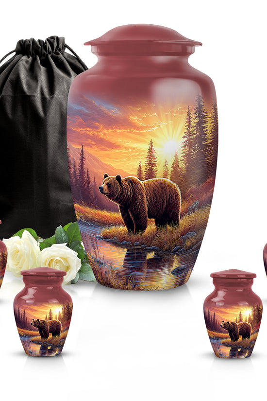 Garnet Red Bear Cremation Urn top-down view of secure threaded lid - classic sculpted bear pattern on smooth aluminum - memorial set with one large and four small urns