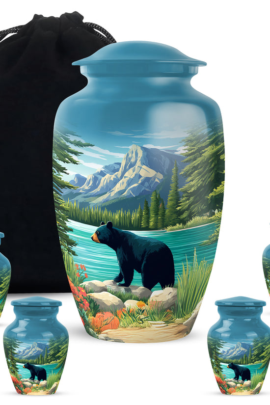 Calming Blue Bear Cremation Urn top-down view of secure threaded lid - traditional bear engraving with hand-polished finish - memorial set with one large and four small urns