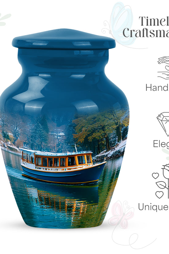 Dusty Blue Boat Cremation Urn close-up of engraving and surface detail - timeless boat motif etched into premium metal - mini keepsake memorial for portion of cremation ashes