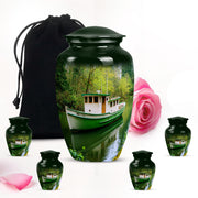 Olive Green Boat Cremation Urn top-down view of secure threaded lid - elegant classic boat relief with fine detailing - memorial set with one large and four small urns