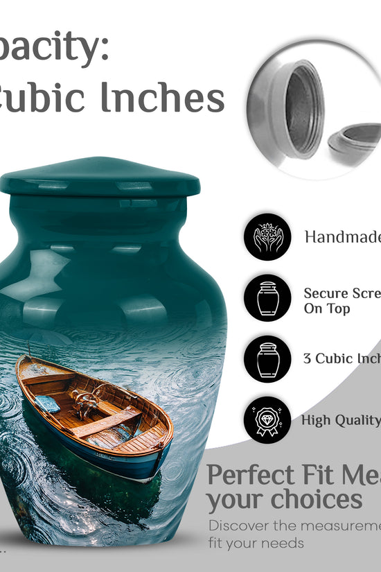Jewel Teal Boat Cremation Urn close-up of engraving and surface detail - timeless boat motif etched into premium metal - mini keepsake memorial for portion of cremation ashes