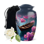 Soft Blue Boat Cremation Urn angled view of lid and engraved motif - traditional boat engraving with hand-polished finish - full-size 10 inch 200 cubic inch adult cremation urn
