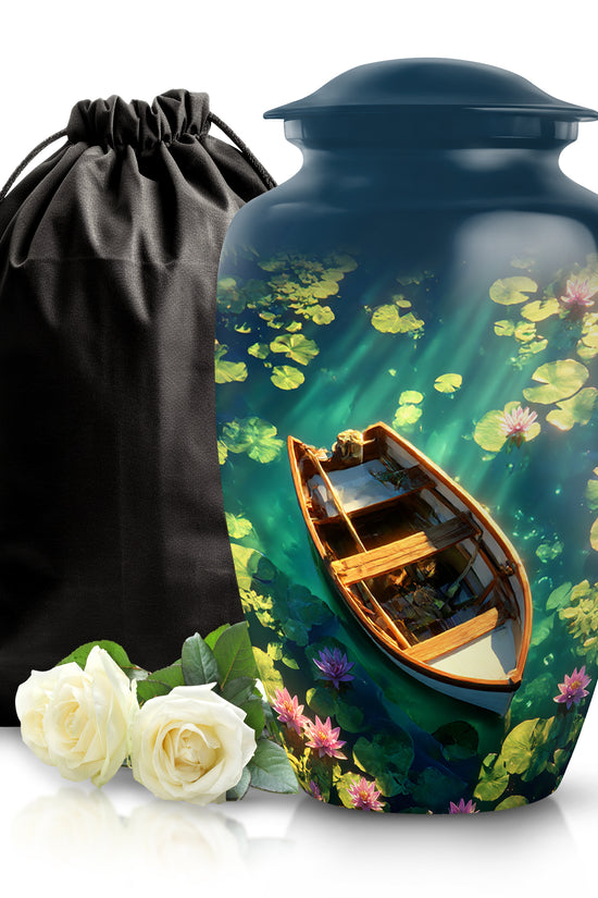 Steel Blue Boat Cremation Urn angled view of lid and engraved motif - traditional boat engraving with hand-polished finish - full-size 10 inch 200 cubic inch adult cremation urn