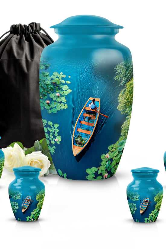 Soft Teal Boat Cremation Urn top-down view of secure threaded lid - timeless boat motif etched into premium metal - memorial set with one large and four small urns