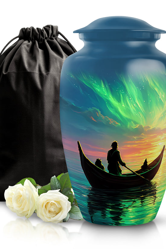 Indigo Boat Cremation Urn angled view of lid and engraved motif - timeless boat motif etched into premium metal - full-size 10 inch 200 cubic inch adult cremation urn