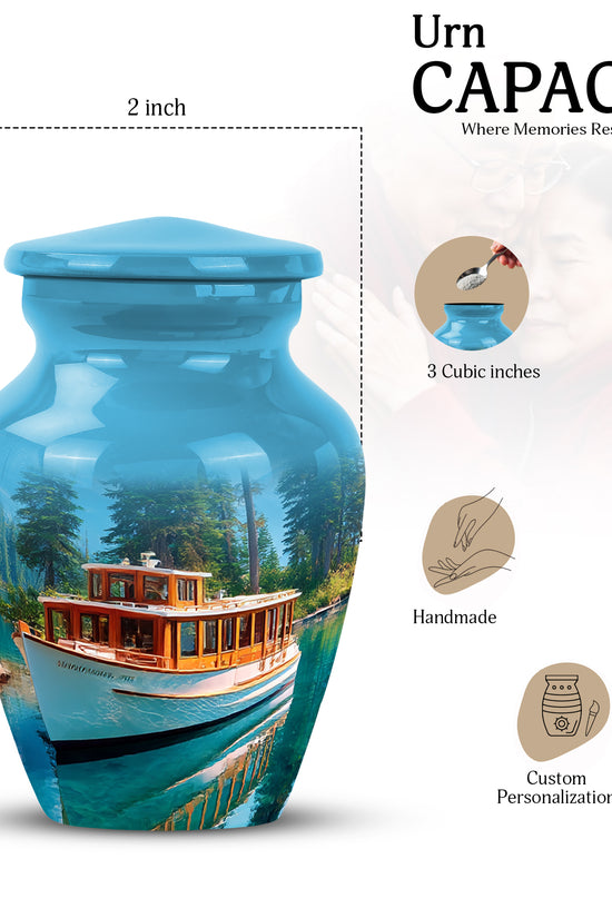 Icy Blue Boat Cremation Urn close-up of engraving and surface detail - timeless boat motif etched into premium metal - mini keepsake memorial for portion of cremation ashes