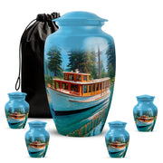 Powder Blue Boat Cremation Urn top-down view of secure threaded lid - classic sculpted boat pattern on smooth aluminum - memorial set with one large and four small urns