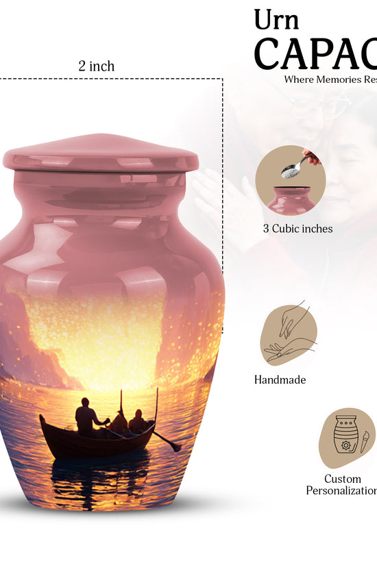 Ruby Red Boat Cremation Urn close-up of engraving and surface detail - traditional boat engraving with hand-polished finish - mini keepsake memorial for portion of cremation ashes