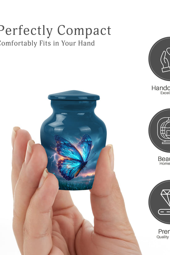 Azure Butterfly Cremation Urn close-up of engraving and surface detail - classic sculpted butterfly pattern on smooth aluminum - mini keepsake memorial for portion of cremation ashes