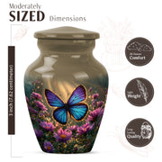 Champagne Gold Butterfly Cremation Urn close-up of engraving and surface detail - classic sculpted butterfly pattern on smooth aluminum - mini keepsake memorial for portion of cremation ashes