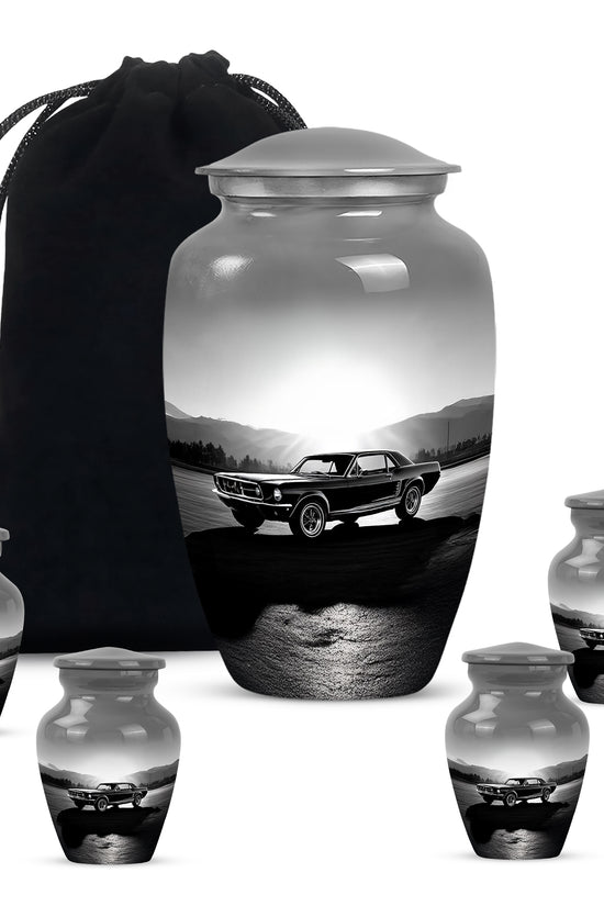 Mist Gray Car Cremation Urn top-down view of secure threaded lid - timeless car motif etched into premium metal - memorial set with one large and four small urns