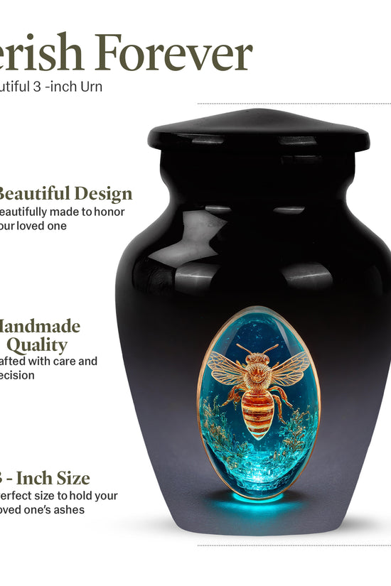 Glossy Black Bee Cremation Urn close-up of engraving and surface detail - timeless bee motif etched into premium metal - mini keepsake memorial for portion of cremation ashes