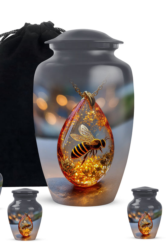 Jet Black Bee Cremation Urn top-down view of secure threaded lid - classic sculpted bee pattern on smooth aluminum - memorial set with one large and four small urns
