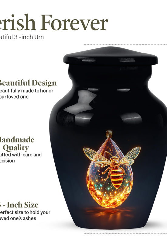 Rich Black Bee Cremation Urn close-up of engraving and surface detail - timeless bee motif etched into premium metal - mini keepsake memorial for portion of cremation ashes