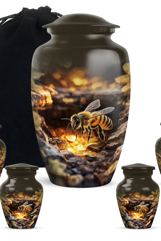 Gilded Gold Bee Cremation Urn top-down view of secure threaded lid - classic sculpted bee pattern on smooth aluminum - memorial set with one large and four small urns