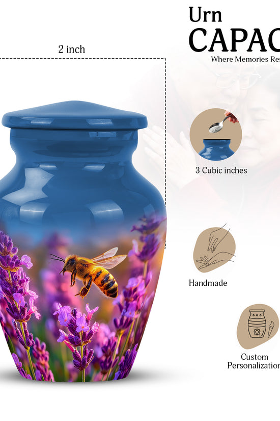 Pastel Blue Bee Cremation Urn close-up of engraving and surface detail - classic sculpted bee pattern on smooth aluminum - mini keepsake memorial for portion of cremation ashes