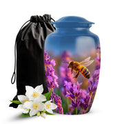 Dusty Blue Bee Cremation Urn angled view of lid and engraved motif - timeless bee motif etched into premium metal - full-size 10 inch 200 cubic inch adult cremation urn