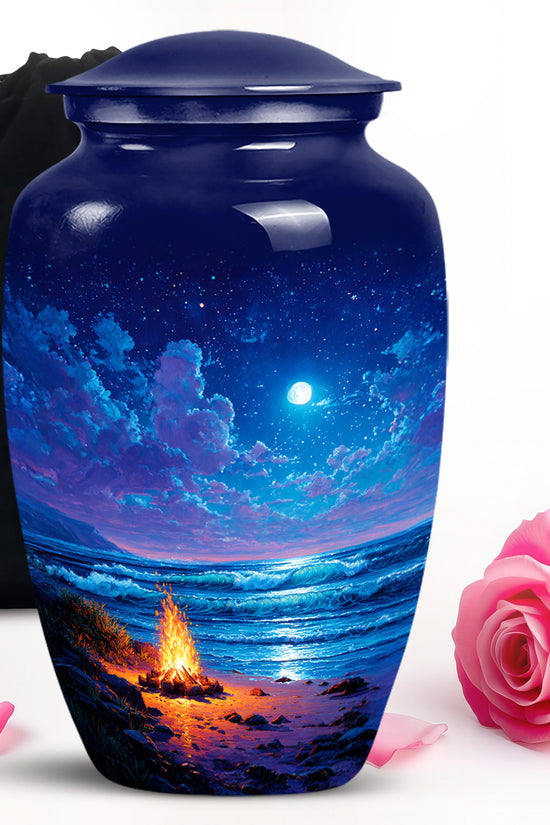 Powder Blue Campfire Cremation Urn angled view of lid and engraved motif - timeless campfire motif etched into premium metal - full-size 10 inch 200 cubic inch adult cremation urn