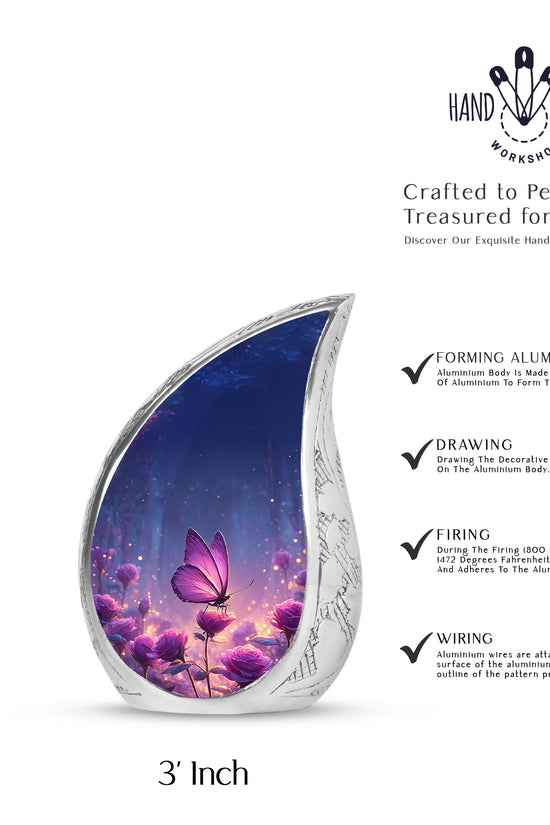 Dusty Blue Butterfly Cremation Urn angled view of lid and engraved motif - rounded teardrop butterfly design with delicate detail - mini keepsake memorial for portion of cremation ashes