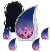 Misty Blue Butterfly Cremation Urn side profile showing urn shape - rounded teardrop butterfly design with delicate detail - memorial set with one large and four small urns