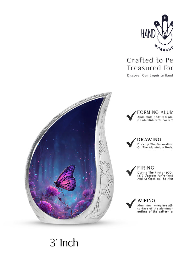 Cornflower Blue Butterfly Cremation Urn angled view of lid and engraved motif - graceful tear-shaped urn with butterfly motif - mini keepsake memorial for portion of cremation ashes