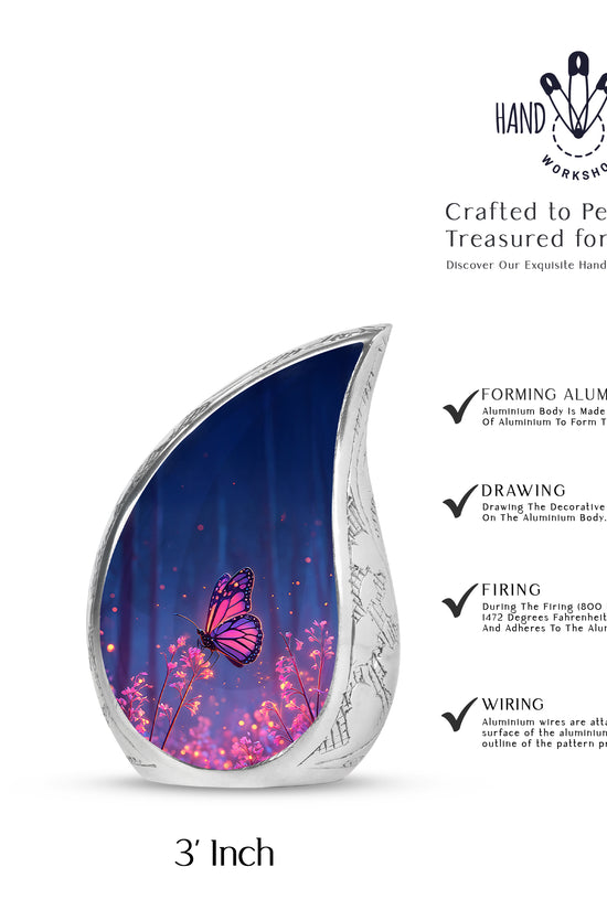 Serene Blue Butterfly Cremation Urn angled view of lid and engraved motif - smooth teardrop contour featuring butterfly art - mini keepsake memorial for portion of cremation ashes