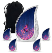 Vivid Blue Butterfly Cremation Urn side profile showing urn shape - smooth teardrop contour featuring butterfly art - memorial set with one large and four small urns