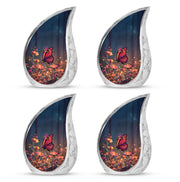 Powder Blue Butterfly Cremation Urn close-up of engraving and surface detail - rounded teardrop butterfly design with delicate detail - 10 inch aluminum urn for cremated remains