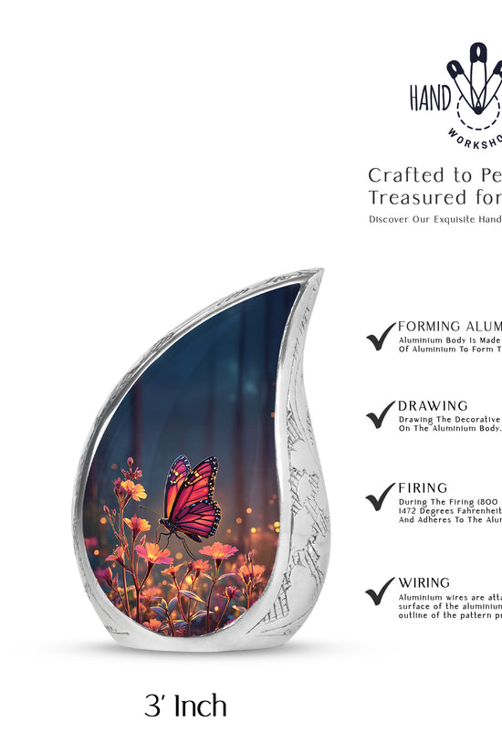 Dusty Blue Butterfly Cremation Urn angled view of lid and engraved motif - flowing teardrop butterfly silhouette on curved aluminum - mini keepsake memorial for portion of cremation ashes