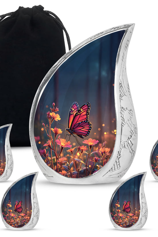 Misty Blue Butterfly Cremation Urn side profile showing urn shape - flowing teardrop butterfly silhouette on curved aluminum - memorial set with one large and four small urns