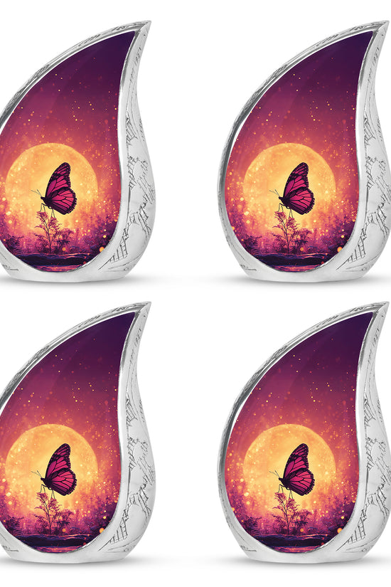 Blush Pink Butterfly Cremation Urn close-up of engraving and surface detail - rounded teardrop butterfly design with delicate detail - 10 inch aluminum urn for cremated remains